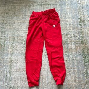Red Nike sweatpants